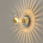Contemporary Wall Light With Sculptural Glass Design And Soft LED Illumination
