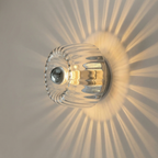Contemporary Wall Light With Sculptural Glass Design And Soft LED Illumination