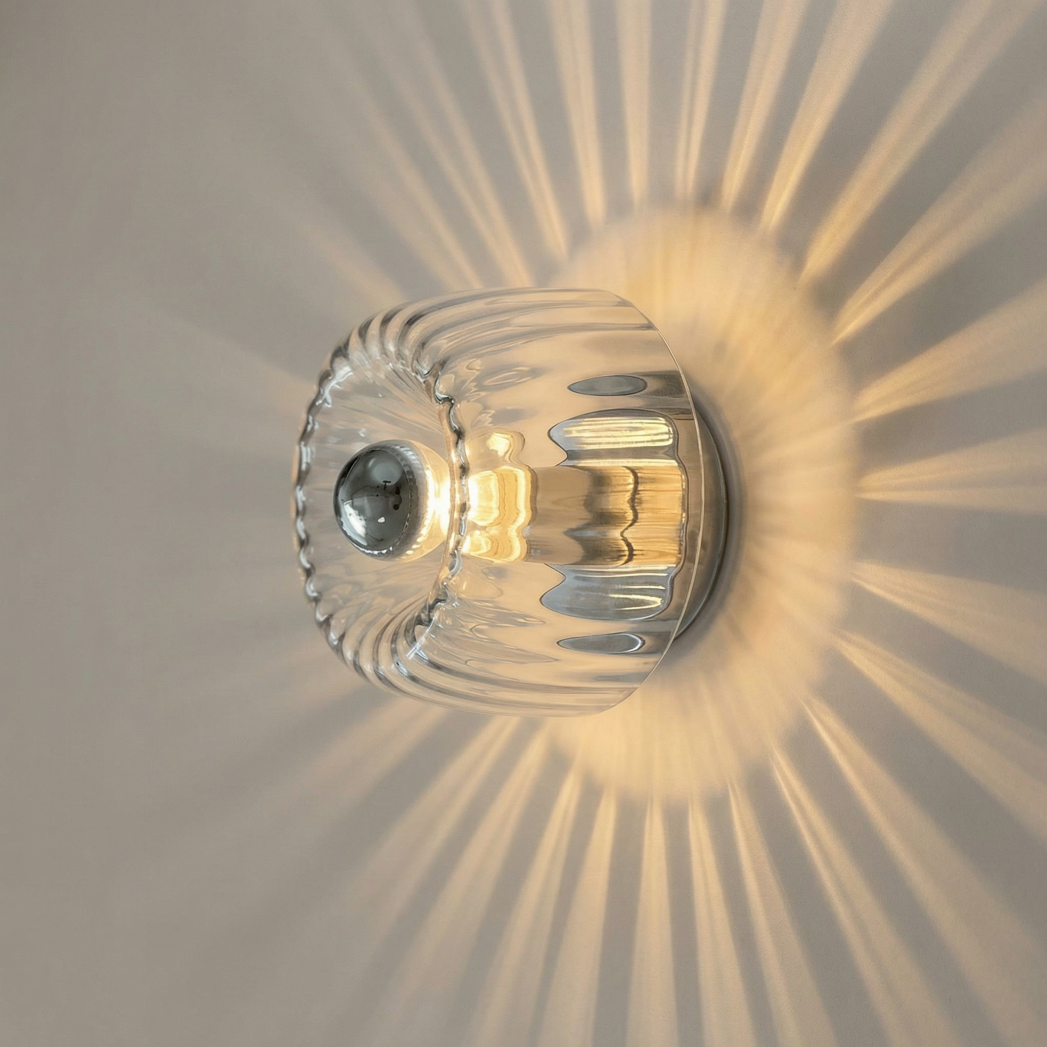 Contemporary Wall Light With Sculptural Glass Design And Soft LED Illumination